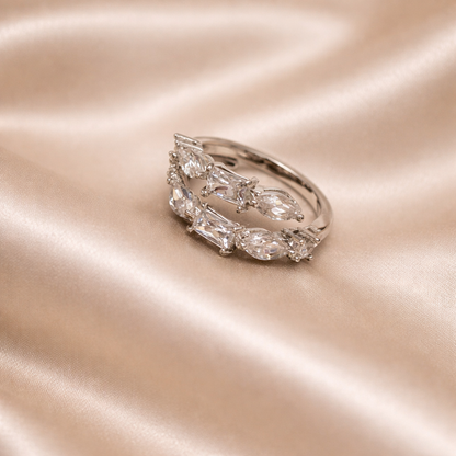 Diamond ring on a pink satin background