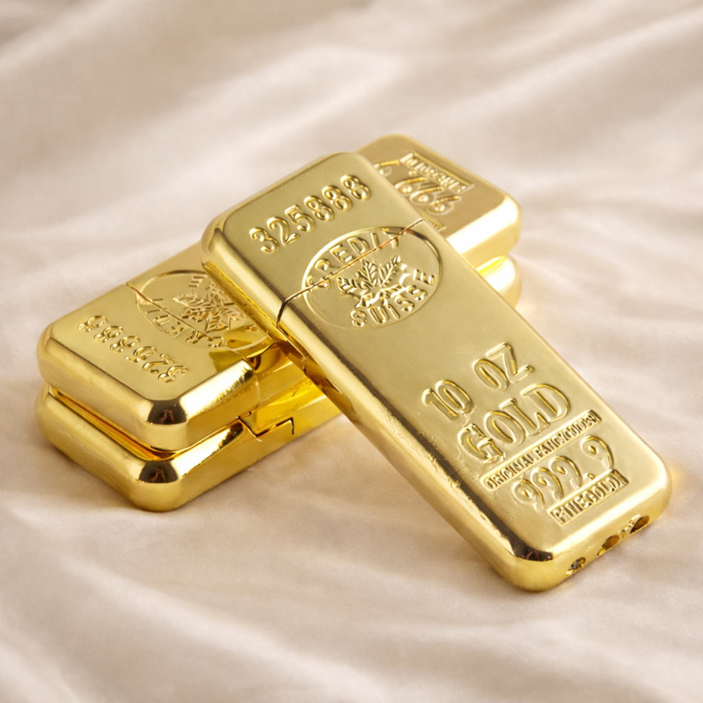 Two gold bars on a light fabric background
