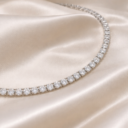 Diamond necklace on a satin surface
